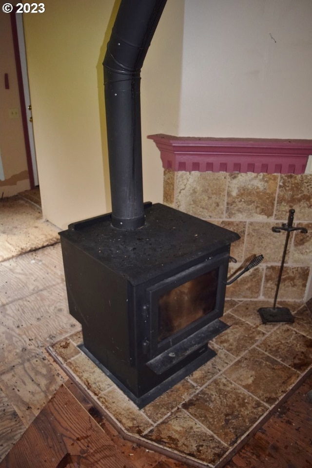 room details featuring a wood stove