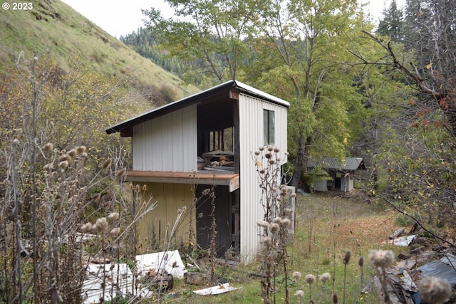 exterior space featuring an outdoor structure