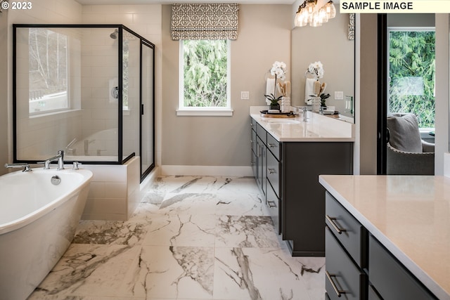 bathroom with oversized vanity, independent shower and bath, and tile flooring