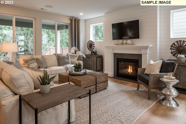 living room with light hardwood / wood-style floors