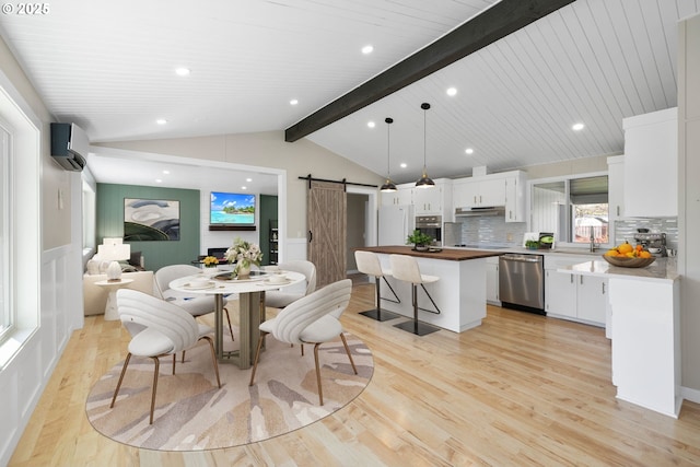 dining area featuring light wood finished floors, a barn door, lofted ceiling with beams, a wall mounted air conditioner, and recessed lighting