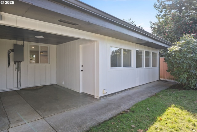 view of property exterior featuring fence