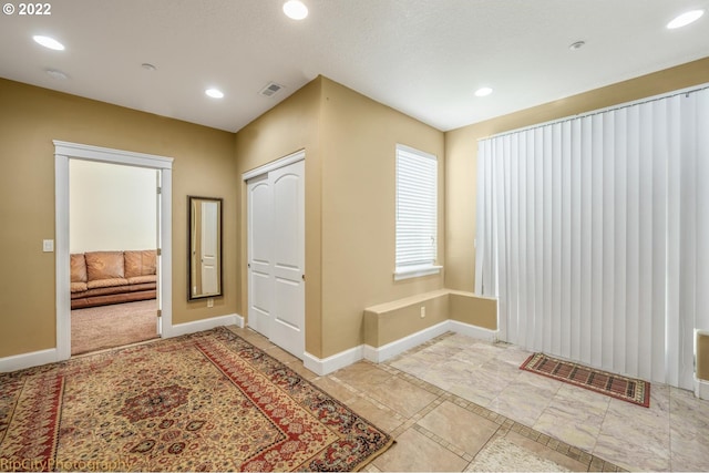 foyer with light tile floors