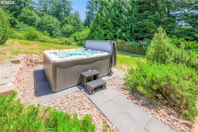 exterior space featuring a hot tub