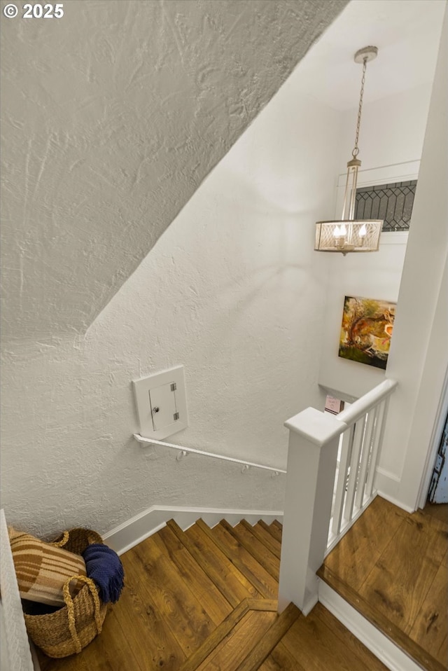 3045 SW Gaston Ave, Portland, OR 97239 - stairway with wood finished floors and baseboards