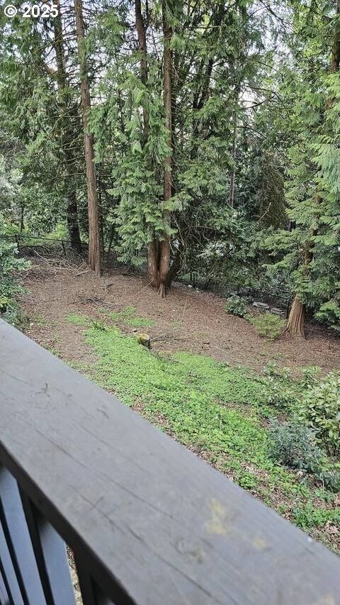 3045 SW Gaston Ave, Portland, OR 97239 - view of yard featuring a wooded view
