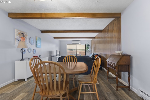 dining space featuring a baseboard heating unit, wood finished floors, beam ceiling, and baseboards