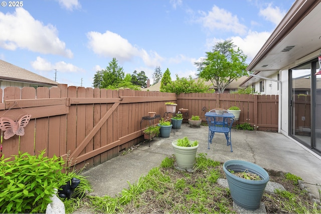 fenced backyard featuring a patio