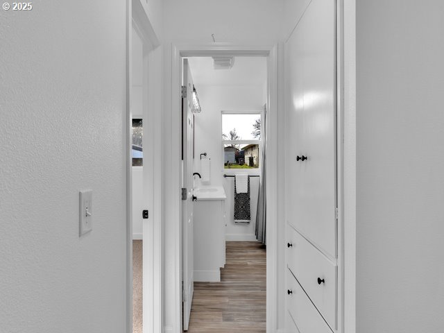 hall featuring light hardwood / wood-style flooring