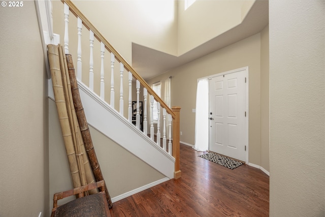 16713 NW Countryridge Dr, Portland, OR 97229 - entryway featuring wood finished floors, stairway, and a high ceiling