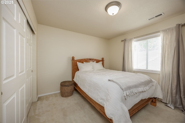 16713 NW Countryridge Dr, Portland, OR 97229 - bedroom featuring a closet and light carpet