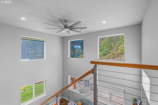 hallway featuring plenty of natural light