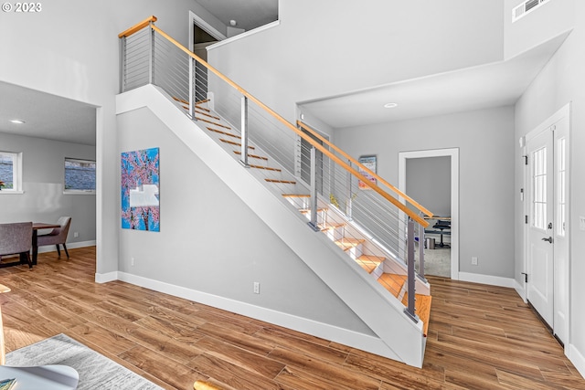 foyer entrance with light wood-type flooring