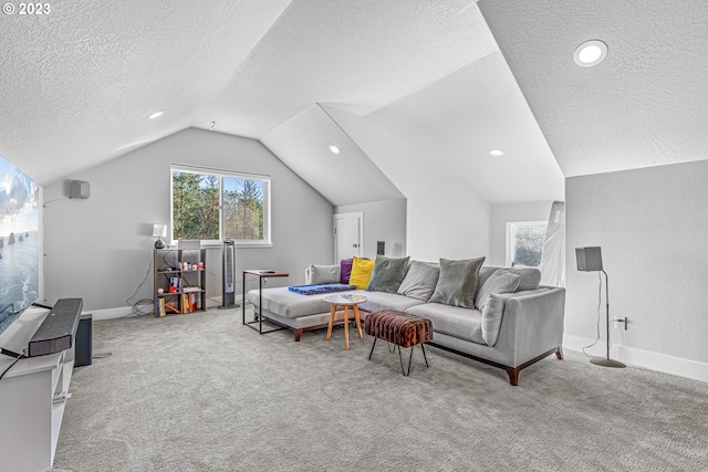 living room with lofted ceiling, light carpet, and a textured ceiling