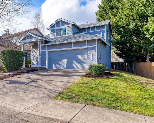 view of front of property with a garage and a front yard