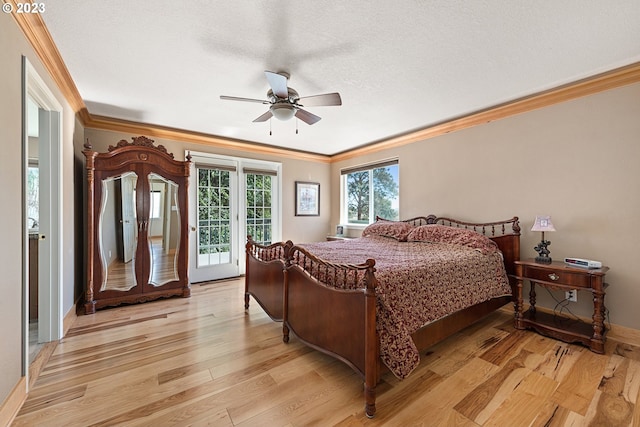 bedroom with ceiling fan, light hardwood / wood-style floors, a textured ceiling, access to exterior, and ornamental molding