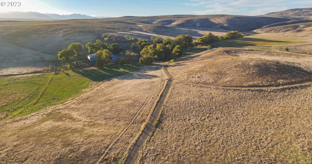 view of mountain feature with a rural view