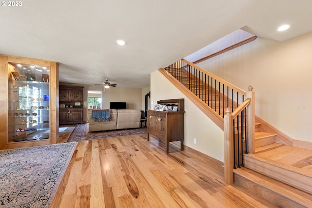 interior space with ceiling fan and light wood-type flooring