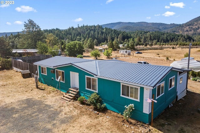 exterior space featuring a mountain view