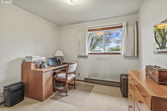 home office with a baseboard heating unit and light colored carpet