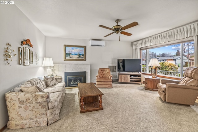 living area with a wall unit AC, a brick fireplace, ceiling fan, and carpet flooring