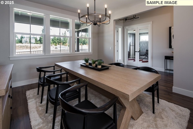 Mountain Home Rd, Sherwood, OR 97140 - dining space with baseboards, a chandelier, french doors, and dark wood-style floors