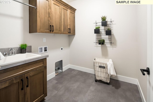 Mountain Home Rd, Sherwood, OR 97140 - laundry room featuring cabinet space, baseboards, hookup for an electric dryer, and hookup for a washing machine