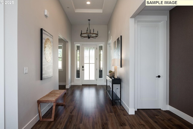 Mountain Home Rd, Sherwood, OR 97140 - foyer entrance featuring dark wood-style flooring, baseboards, and a chandelier