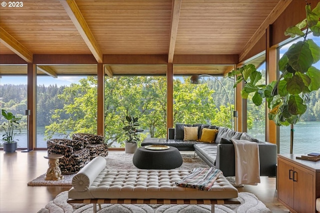 sunroom / solarium featuring a water view, wood ceiling, and plenty of natural light