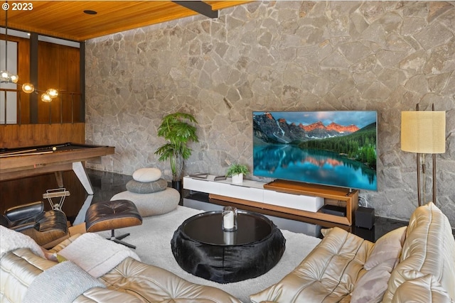 sitting room with wood ceiling and billiards