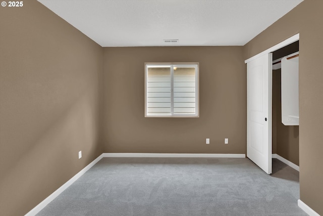 2622 Princeton Pl, Forest Grove, OR 97116 - unfurnished bedroom with carpet flooring, baseboards, and a closet