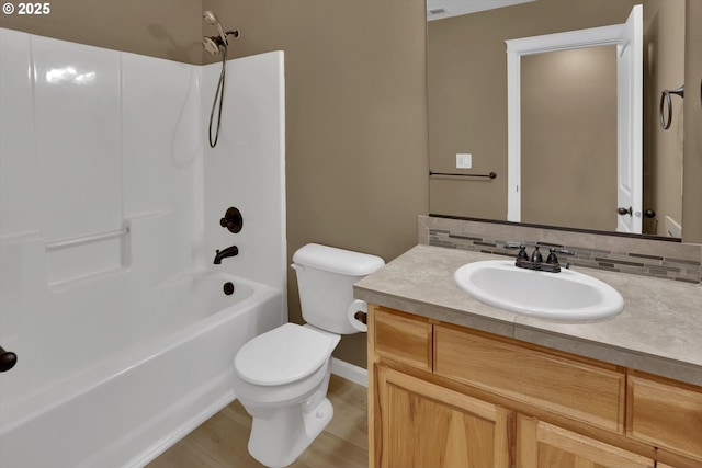 2622 Princeton Pl, Forest Grove, OR 97116 - bathroom featuring toilet, vanity, bathing tub / shower combination, baseboards, and wood finished floors