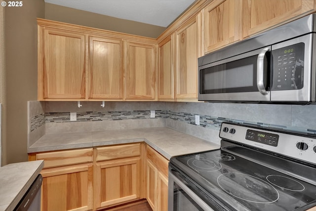 2622 Princeton Pl, Forest Grove, OR 97116 - kitchen with stainless steel appliances, light brown cabinetry, decorative backsplash, and light countertops
