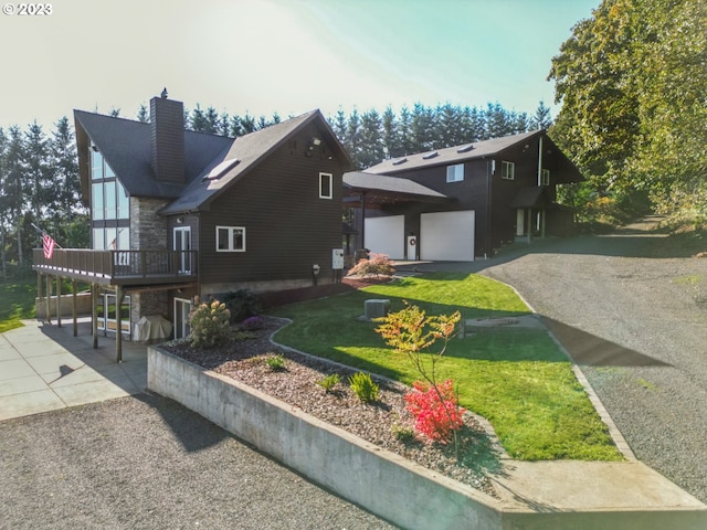 22000 SE Upper Matthews Creek Ln, Amity, OR 97101 - view of front of property featuring a wooden deck, a patio, and a front yard