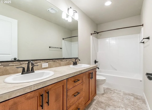 full bathroom featuring toilet,  shower combination, double vanity, decorative backsplash, and baseboards