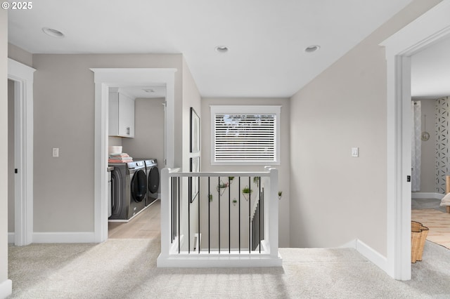 hall with baseboards, independent washer and dryer, carpet, an upstairs landing, and recessed lighting