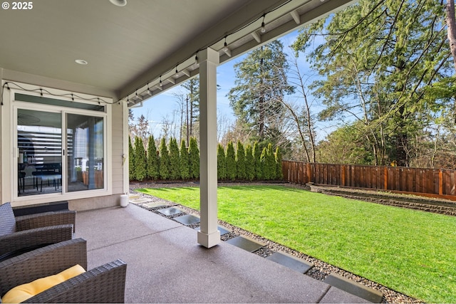 view of patio with a fenced backyard