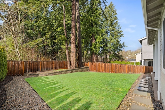 view of yard featuring a fenced backyard