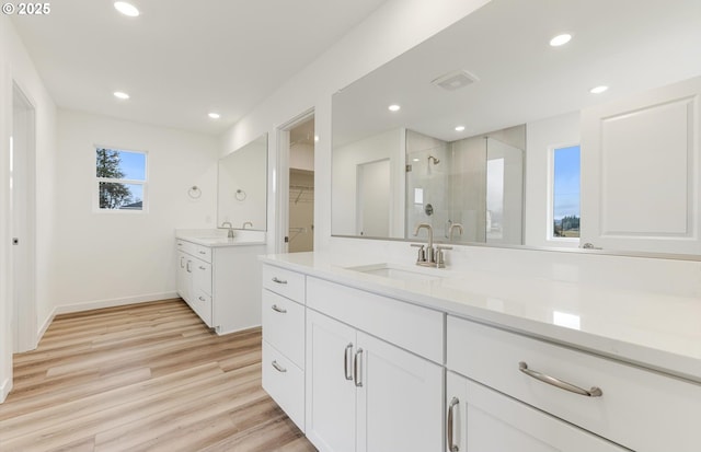 spare room featuring a wealth of natural light and light colored carpet