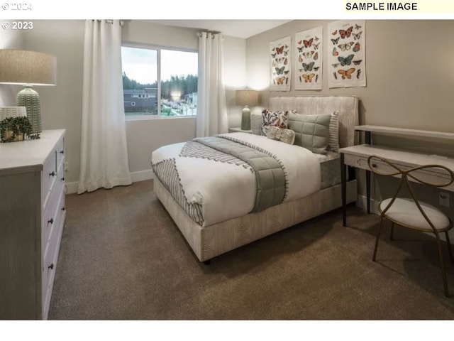 bedroom with dark carpet