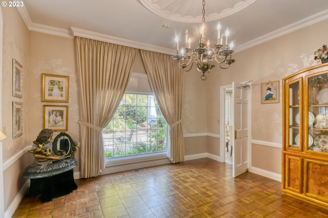 interior space with crown molding, a chandelier, and parquet floors