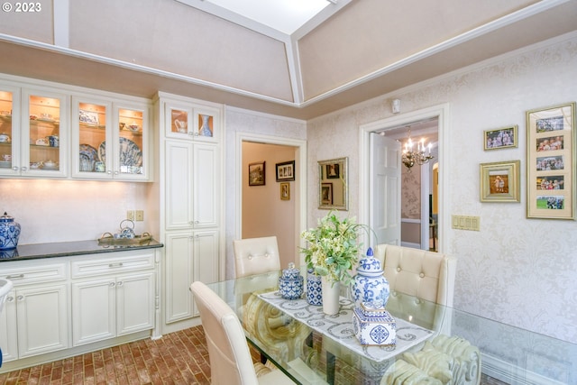 dining area featuring an inviting chandelier