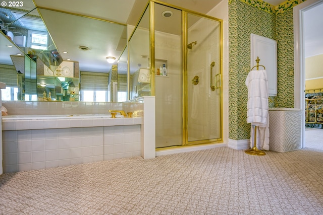 bathroom with tile floors and a shower with door