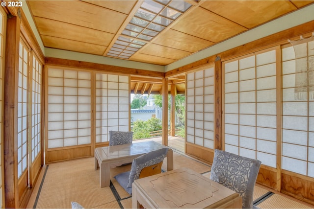 dining area featuring wooden ceiling