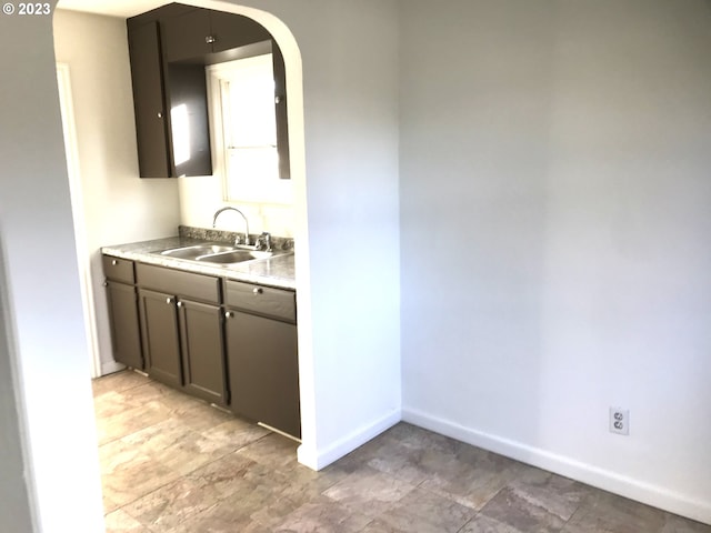 bathroom featuring vanity and tile flooring