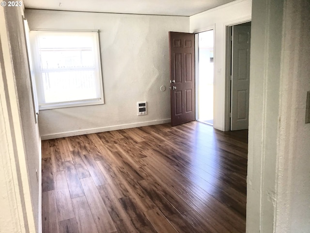 empty room featuring dark wood-type flooring