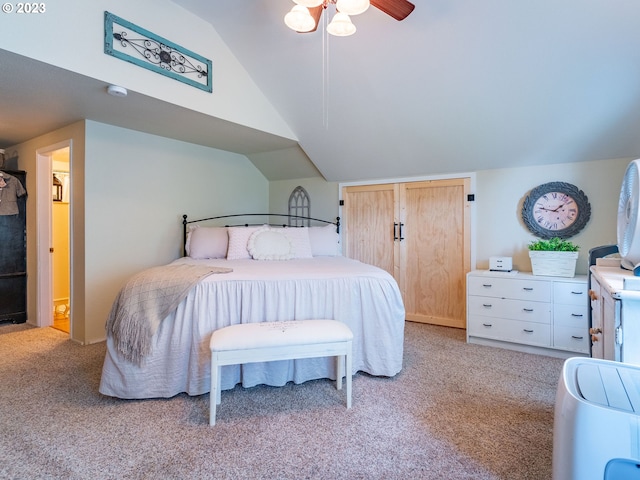 bedroom featuring light carpet, ceiling fan, and vaulted ceiling