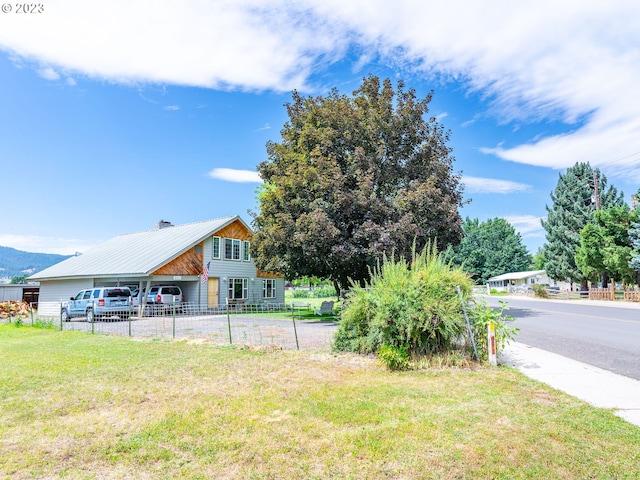 view of yard featuring a carport