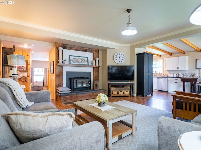 living room featuring crown molding, dark hardwood / wood-style floors, and beamed ceiling