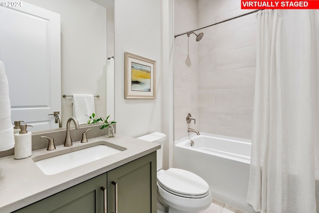 full bathroom with vanity, shower / bathtub combination with curtain, and toilet